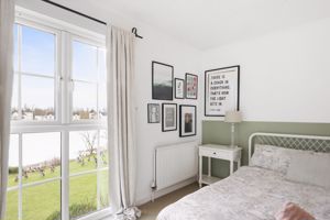 Master bedroom view over lake- click for photo gallery